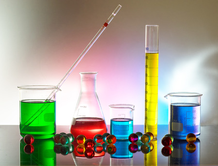 Laboratory glassware still life with colorful reactivesの写真素材