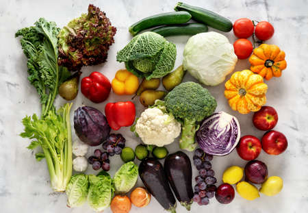 Top view of fresh vegetables varriety on white backgroundの写真素材