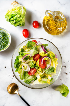 Fresh and healthy vegan green salad full of vitaminsの写真素材