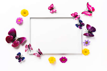 White frame mockup with vivid violet butterflies and flowers. Color trends of 2022. Copy space....