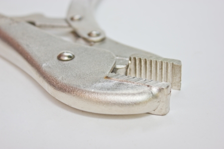 Close up Of Locking Pliers With Opened Jaws の写真素材