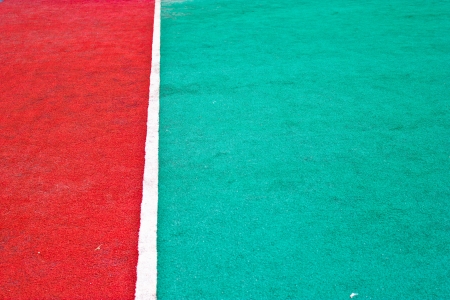 Fake grass and white line as background の写真素材