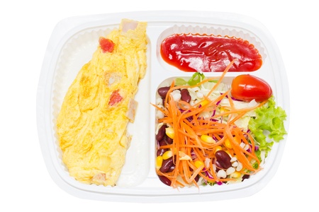 Omelette with fresk salad in white plastic box 