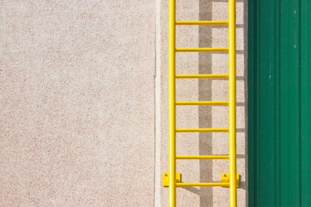 Yellow ladder with space for text.の写真素材