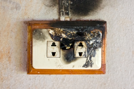 Burned plug socket の写真素材