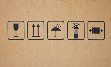 Fine image close-up of fragile symbol on cardboard の写真素材