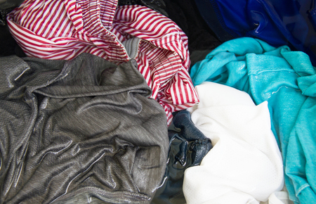 Laundry with Sudsy Water In Washing Machine