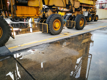 Close Up Wheel Rubber Tried Gantry Cranes (RTG) At Industrial Portの写真素材