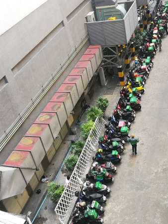 Bangkok Thailand April 2021 Top View Motorbike delivery food is parked to pick up food and take it to the consumers.のeditorial素材