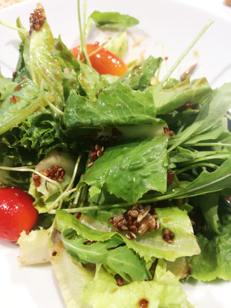 Organic Salad on White Plate Close Up View.の写真素材