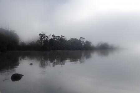 Mist over still waterの写真素材