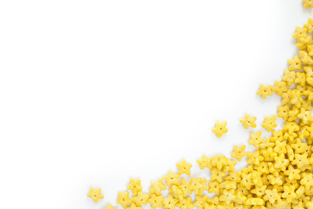Frame Corn Flakes in the form Stars Isolated Top View on White Background の写真素材
