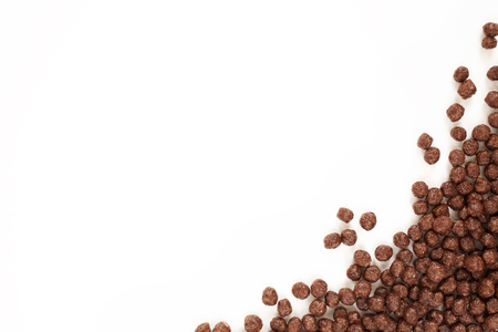 Frame Corn Flakes Chocolate Balls Isolated Top View on White Backgroundの写真素材