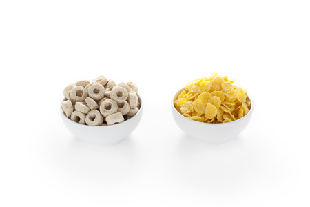 Corn Flakes in the Bowl Isolated Top View on White Backgroundの写真素材