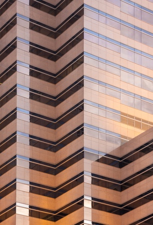 warm tone mirror glass building, exterior building