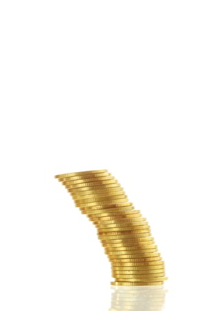 Gold coin heap isolated on white backgroundの写真素材
