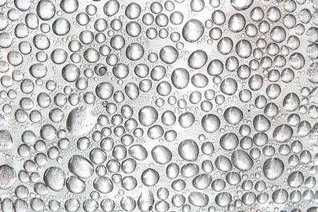 group of drop of water on glass surfaceの写真素材