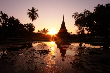 Silhouette pagoda at Sukhothai Historical Park, Thailandの写真素材