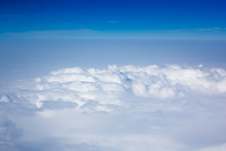 blue sky above overcast cloud air view background onlyの写真素材