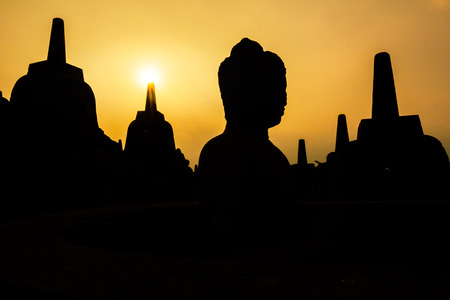 Silhouette Borobudur Temple at sunrise time with light burst, Yogyakarta, 
Java, Indonesia.の写真素材