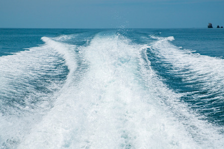 view water stream behind the speed boat day timeの写真素材