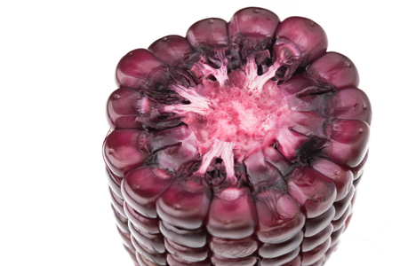 purple corn macro , cut piece isolated on white background