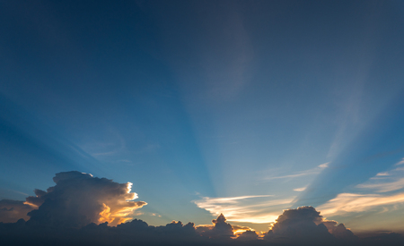 Sun rays through clouds like an dramatic explosion , power nature background.の写真素材