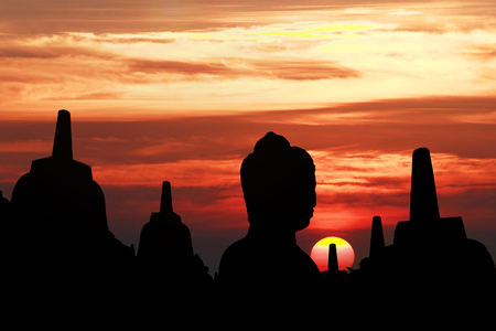 Silhouette Borobudur Temple at sunrise time with light burst, Yogyakarta, 
Java, Indonesia.の写真素材