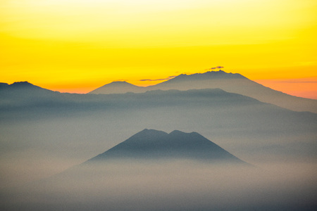 foggy and mountain , twilight time show colorful of lightの写真素材