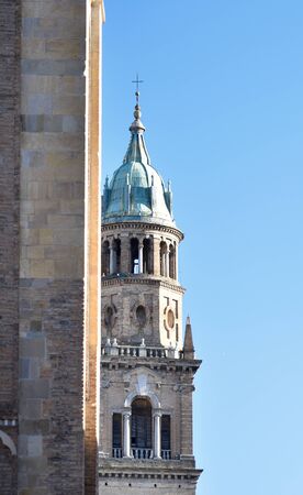 Detail of the tower of the Church of San Giovanni Evangelista, seen from the tower of the Cathedral of Parma, on a sunny winter dayの写真素材