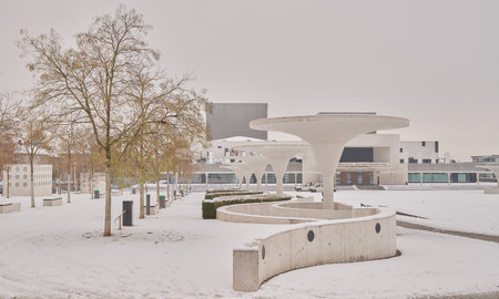 Darmstadt, Germany, 02 Dec 2020: City theater, main facade view from Georg BÃ¼chner Platz covered by snowのeditorial素材
