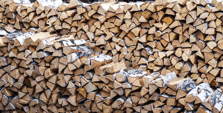 Beautifully folded wood pile of birch.の写真素材