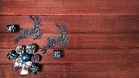 Beautiful Christmas composition on wooden background. Place for inscription on the right.の写真素材