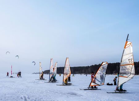 NOVOSIBIRSK, RUSSIA - DECEMBER 6 2017: Children are preparing for the start of the kitesurfing competition.のeditorial素材