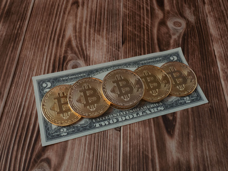 Physical version of Bitcoin and banknotes of two dollar. Exchange bitcoin for a dollar. Conceptual...