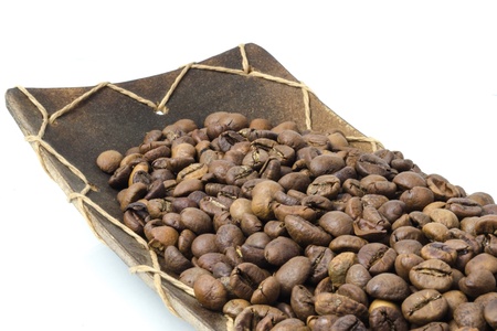 coffee beans, wooden plate on white backgroundの写真素材