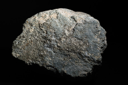 Nugget Of Gold On A Black Backgroundの写真素材