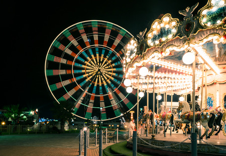 lights at the carousel, moving carouselの写真素材