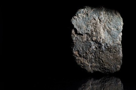 Nugget Of Gold On A Black Background