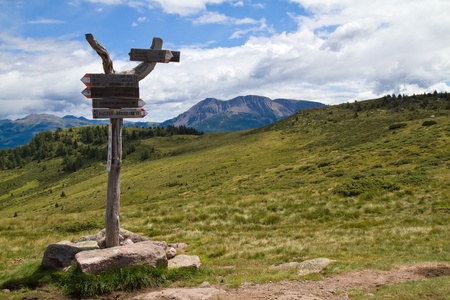 Sign post in the mountains in South Tyrol, Italyの写真素材