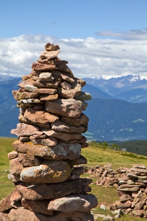 Stone man in the italian alps の写真素材