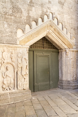 Historic church door in Italyの写真素材