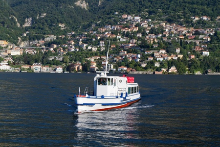 Passenger ferry crossing lake Como, Italyの写真素材