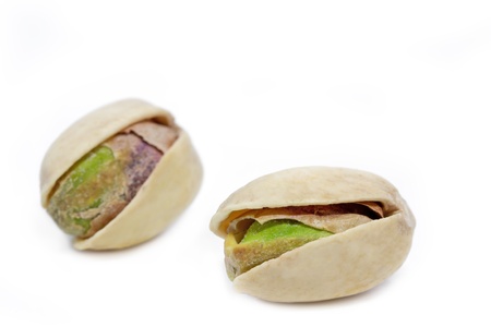 Pistachio nuts on white backgroundの写真素材
