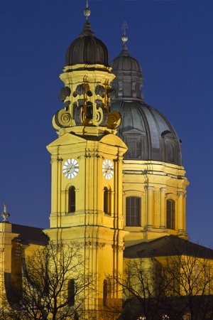 The famous Theatinerkirche church in Munich, Germany, at nightの写真素材