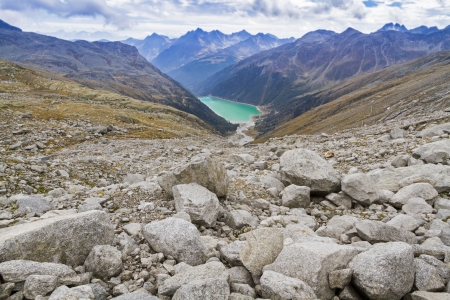 Neves water reservoir in northern Italy embedded in mountain sceneryの写真素材