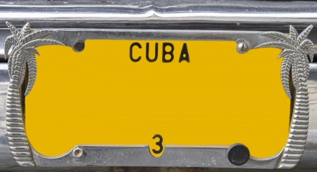Yellow vintage numberplate on Cubaの写真素材