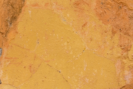 Weathered orange wall as background