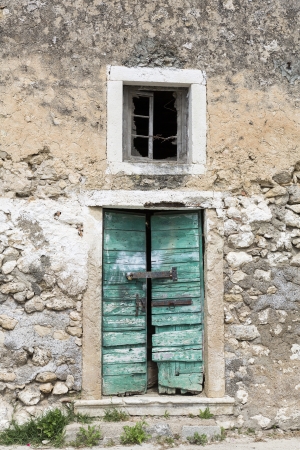Door of an abandoned house in Greeceの写真素材