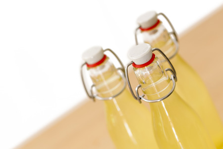 Bottles filled with elderflower syrup, shallow DOFの写真素材